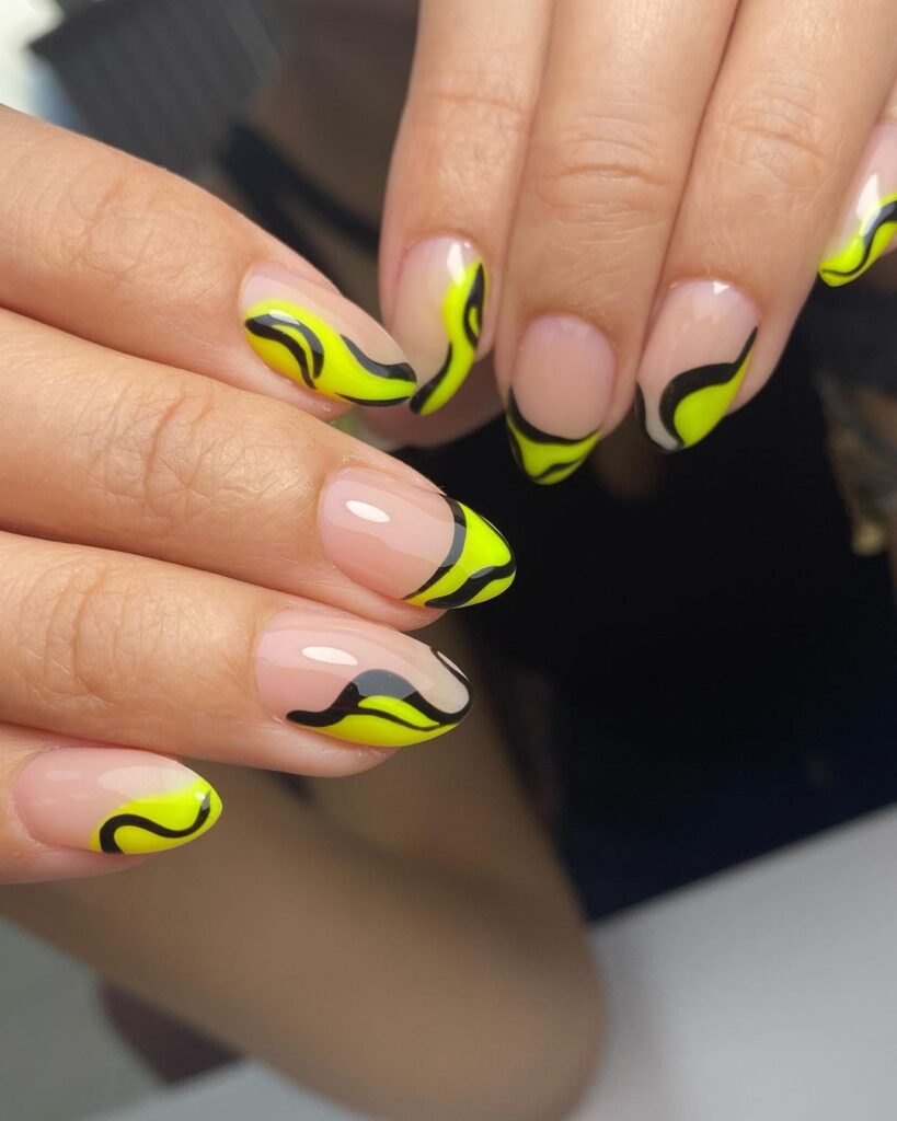 Nude-Nail-with-Yellow-and-Black-Swirl